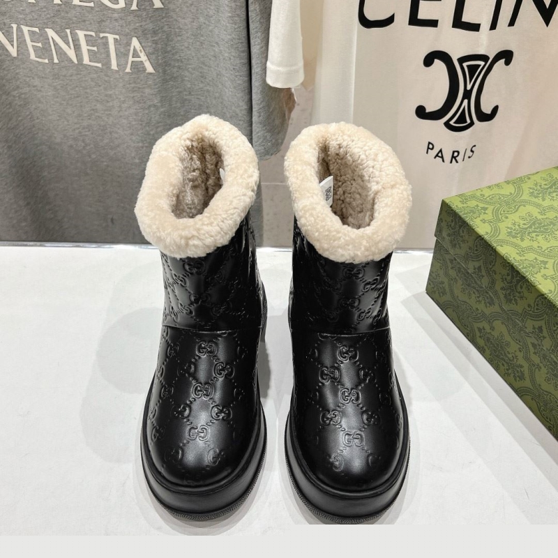G*u*i boots